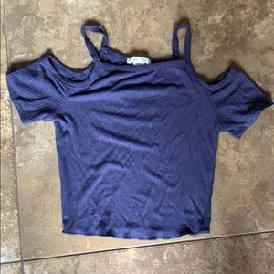 blue shirt with shoulder cut outs